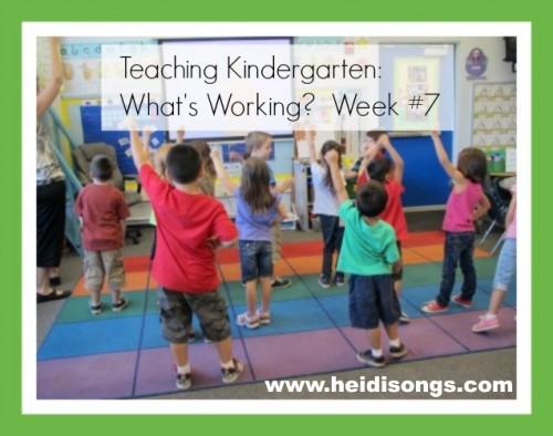 Children raising hands on a classroom carpet, overlaid headline Teaching Kindergarten: What's Working? Week #7